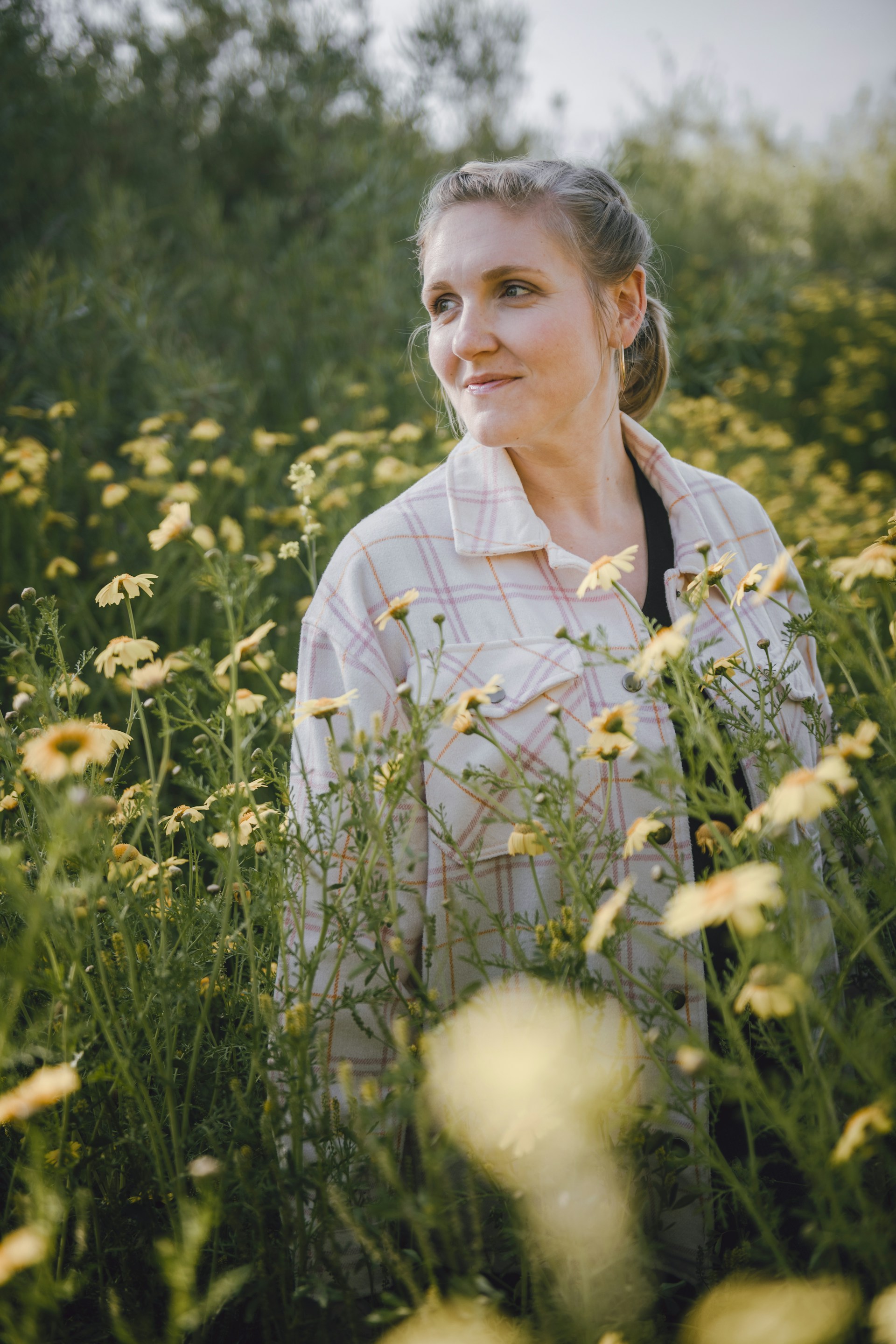 Woman in a field of flowers — intro video poster